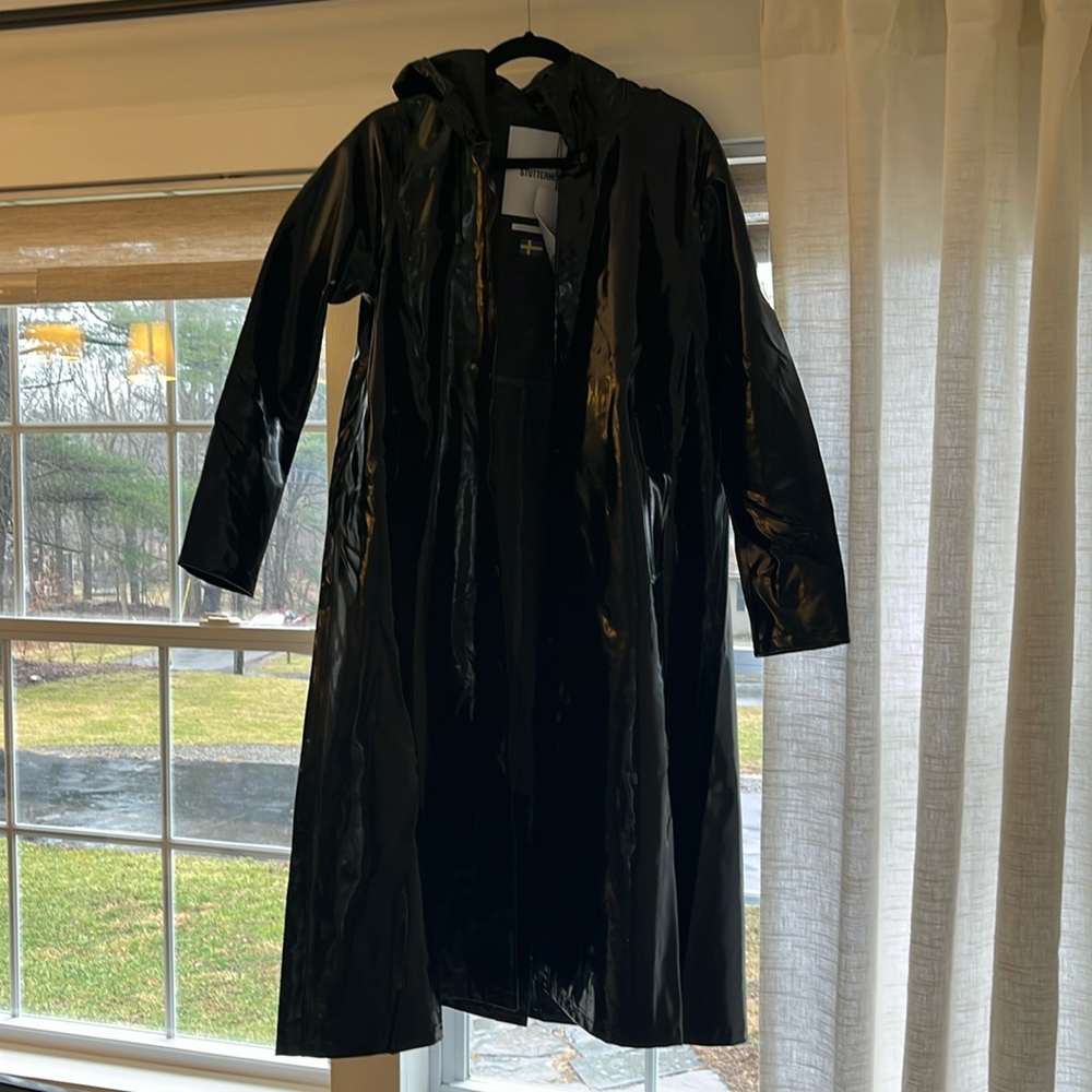 Stuttering Shiny rain jacket with hood size xs
